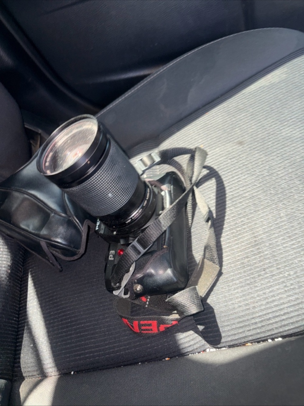 Pentax Black SLR Camera with Telephoto Lens